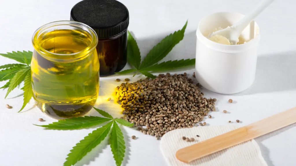 Cannabis seeds and oil with leaves